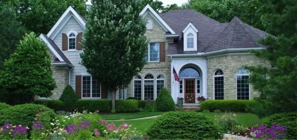 luxury landscape design and maintenance Lifestyle Landscaping large home with beautiful landscaping