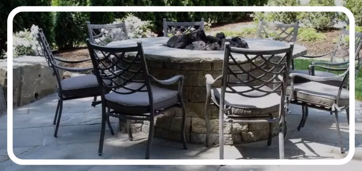 patio with stone fire pit
